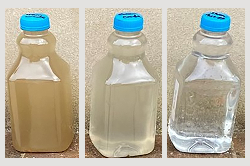 Images of three sample bottles, each filled with water of different levels of clarity