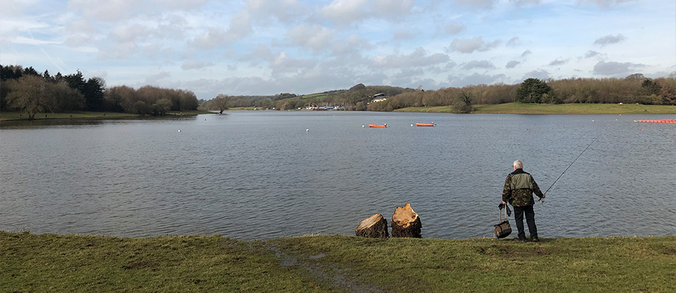 Man fishing at Sutton Bingham